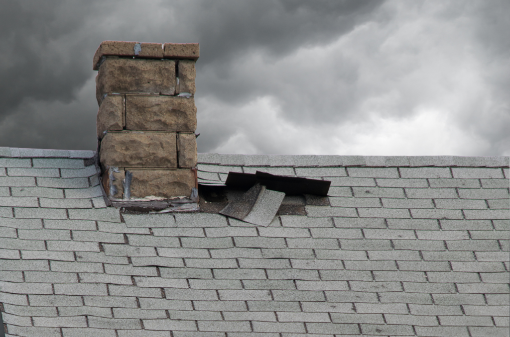 damage on a roof post-storm