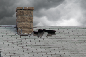 damage on a roof post-storm