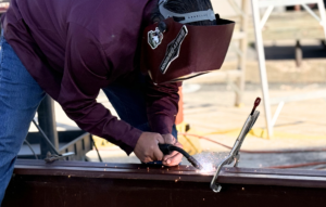 man welding